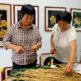 麦秆画里话丰收