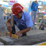 两会网评丨读懂“小砌匠”走上“代表通道”的时代内涵