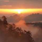 晨光破雾,霞染千峰!张家界黄石寨迎来绝美日出云海奇观