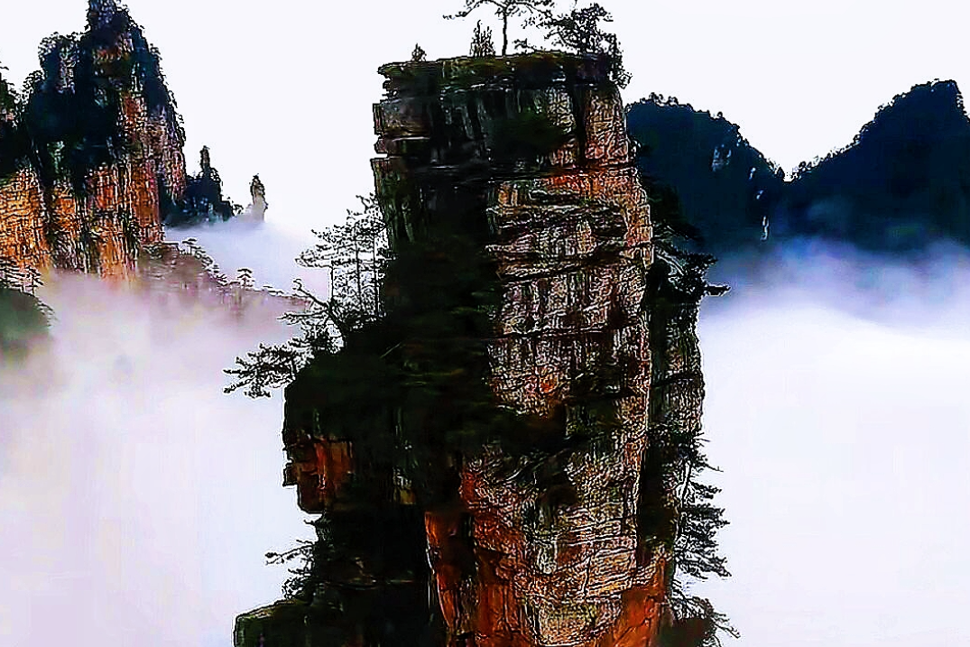 雾锁千峰浪卷云，张家界藏一域山河仙境