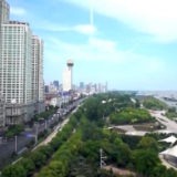 新闻特写:“重启”一年 风雨过后见彩虹