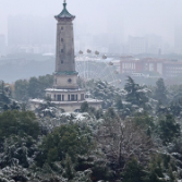 组图|白雪却嫌春色晚 “雨水”节气后的长沙再度迎来降雪