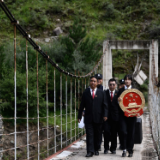 迈出法治中国建设新步伐——新时代推进全面依法治国述评