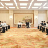 谢卫江会见中金公司董事长陈亮和京能国际董事会主席张平一行