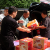 三千红甲闻“汛”动，汨罗江畔战洪峰