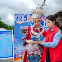 靖州税务:“税惠侗乡·集章游园”打造普法新体验