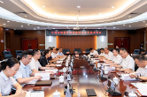 何朝晖与中国供销商贸流通集团总经理温琦一行座谈交流
