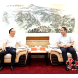 朱健会见中国铁建港航局集团总经理金国亮一行