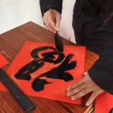 【湖湘年味】春联贴门楣,热饺暖胃肠:来安乡看这场有“味”的新春慰问