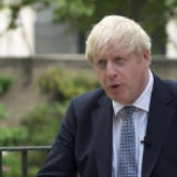 英国首相鲍里斯·约翰逊：疫情初期 也许我们本可以做得不同