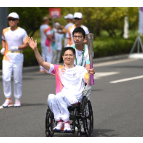杭州亚运会|轮椅上的火炬手范丙:这一棒,为“自强不息”