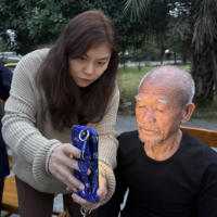 湖南新田:晨集夜市的“社保摊” 服务百姓“不打烊”