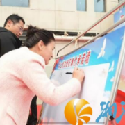 观音港社区以“签名承诺+文化展演”推动禁燃宣传深入人心