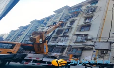 社区协调解民忧 更换管道除顽疾