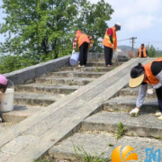 志愿清障护古桥 文脉焕发新容颜