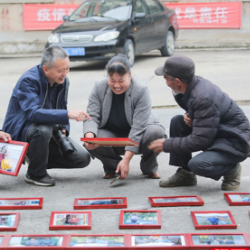 苏仙区：送摄影作品下乡 把美好的记忆留给老百姓