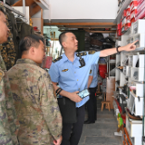 醴陵军地开展“守护戎装”专项整治 违规涉军招牌当场拆除