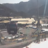 日媒记者探访冬残奥会高山滑雪场地 高处拍视频介绍风光