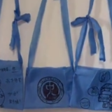 上海方舱医院暖心事：“大白”背上自制手绘包 “舱友”心愿墙上抒心愿！