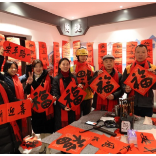 暖“新”同行 袁家岭商圈快递小哥、网约车司机共享团圆饺子宴