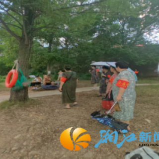 荣华社区：湘江边巡逻 及时劝导野泳保安全