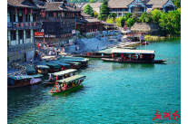 People Take Boat Tour in Biancheng Town