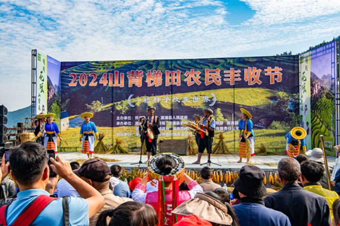 People Celebrate Harvest at Shanbei Terraced Fields