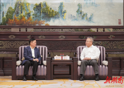 沈晓明与贺东风一行会谈