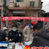 芷江冷水溪司法所开展大学生志愿者春节“送法下乡”活动
