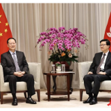 毛伟明会见李家超