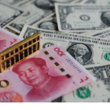 人民币中间价上行93个基点 未来将延续双向浮动