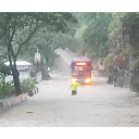 我站在风雨里，你走进我心里——听，这是共产党员的声音