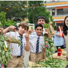 乡村行·看振兴丨“洋学生”做客浙江义乌乡村小学 学剪纸悟文化