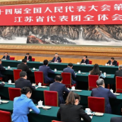习近平两会时刻丨小社区里的“国之大者”