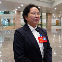 沈娟：推进路缘石弧形化改造 让城市管理更精细更有温度