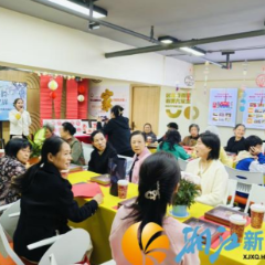 铜盆湖社区:银剪裁窗花 匠心映夕辉