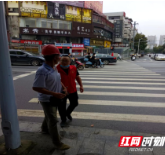 隆回县委网信办助力创文开展交通劝导活动