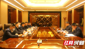 严华与中国联通湖南省分公司党委书记、总经理欧阳恩山一行座谈