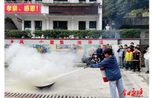 石堤镇中心完小开展灭火实操培训