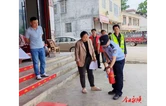 四联村开展经营场所消防宣传暨消防器材免费配发活动