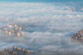 怀化鹤城区：云雾缭绕如幻境城市宛如“天空之城”