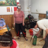 斜水塘社区:党建红牵起志愿心 文明实践护好烟火安