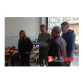 油洋乡：“敲门行动”忙，民兵来助力
