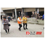 油洋乡利用赶集日开展爱国卫生月宣传活动