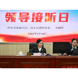 韦朝晖接听12345政务服务便民热线