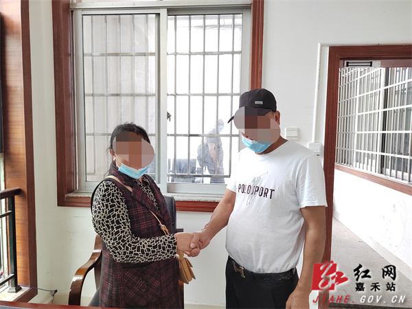 法院双方握手言和.jpg