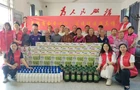 石桥镇仙人桥村罗慧携民远商会爱心人士回娘家献爱心