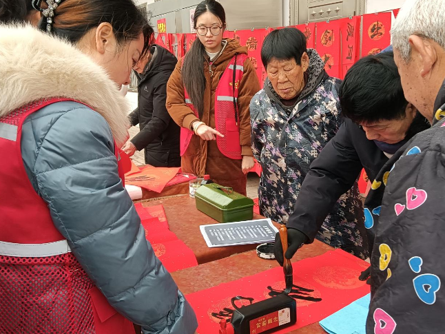 墨香迎新春 暖心送祝福 ——滨江街道金台社区开展迎新春义写春联送福活动