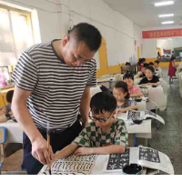涟源市文化馆举办留守儿童免费书法培训班