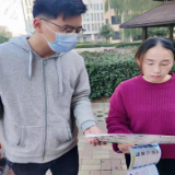 发传单、讲常识  助力生活垃圾分类投放